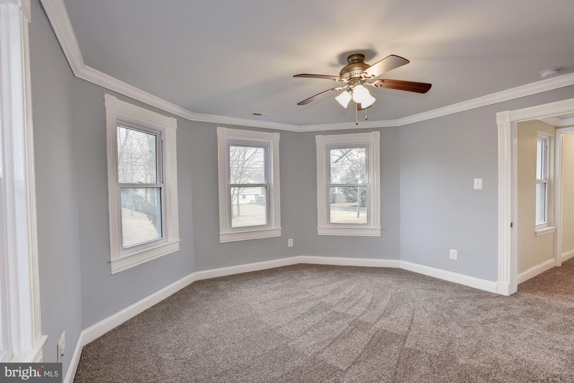 3220 Rolling Rd. Baltimore, MD 21244 - Photo 24 of 28 wooden floor in an empty room with a window