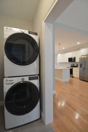 a utility room with washer and dryer