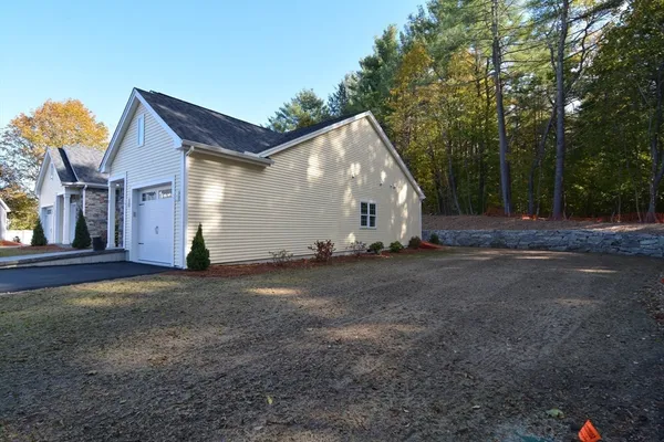 a view of house with garden
