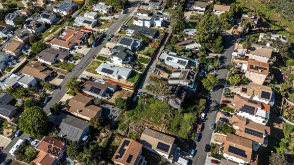 an aerial view of residential house with parking space
