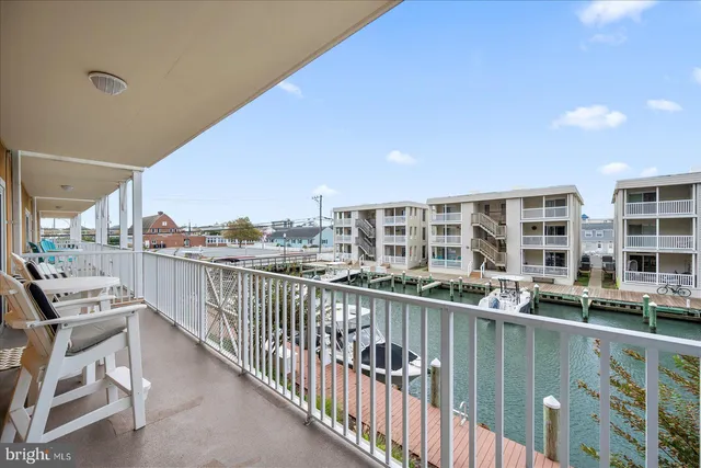 a view of a lake with building in front of it