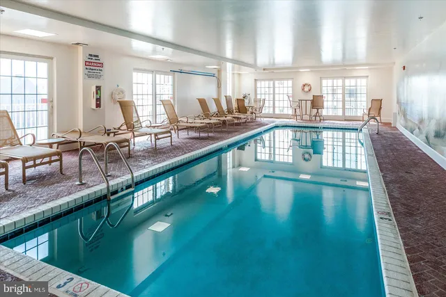 a view of tall building with lake view