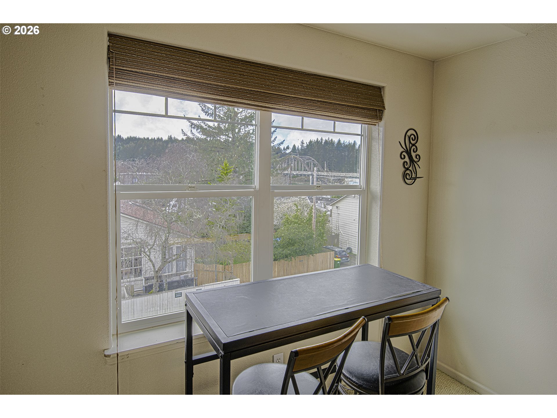 179 Laurel Street, Unit 9 Florence, OR 97439 - Photo 12 of 37 a view of a dining room with furniture window and outside view