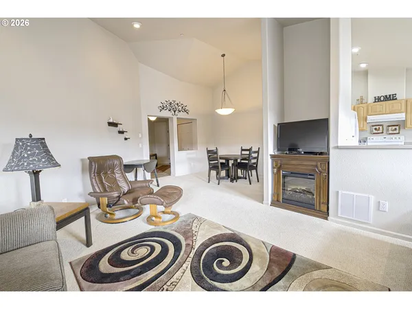 a view of livingroom with furniture and fireplace
