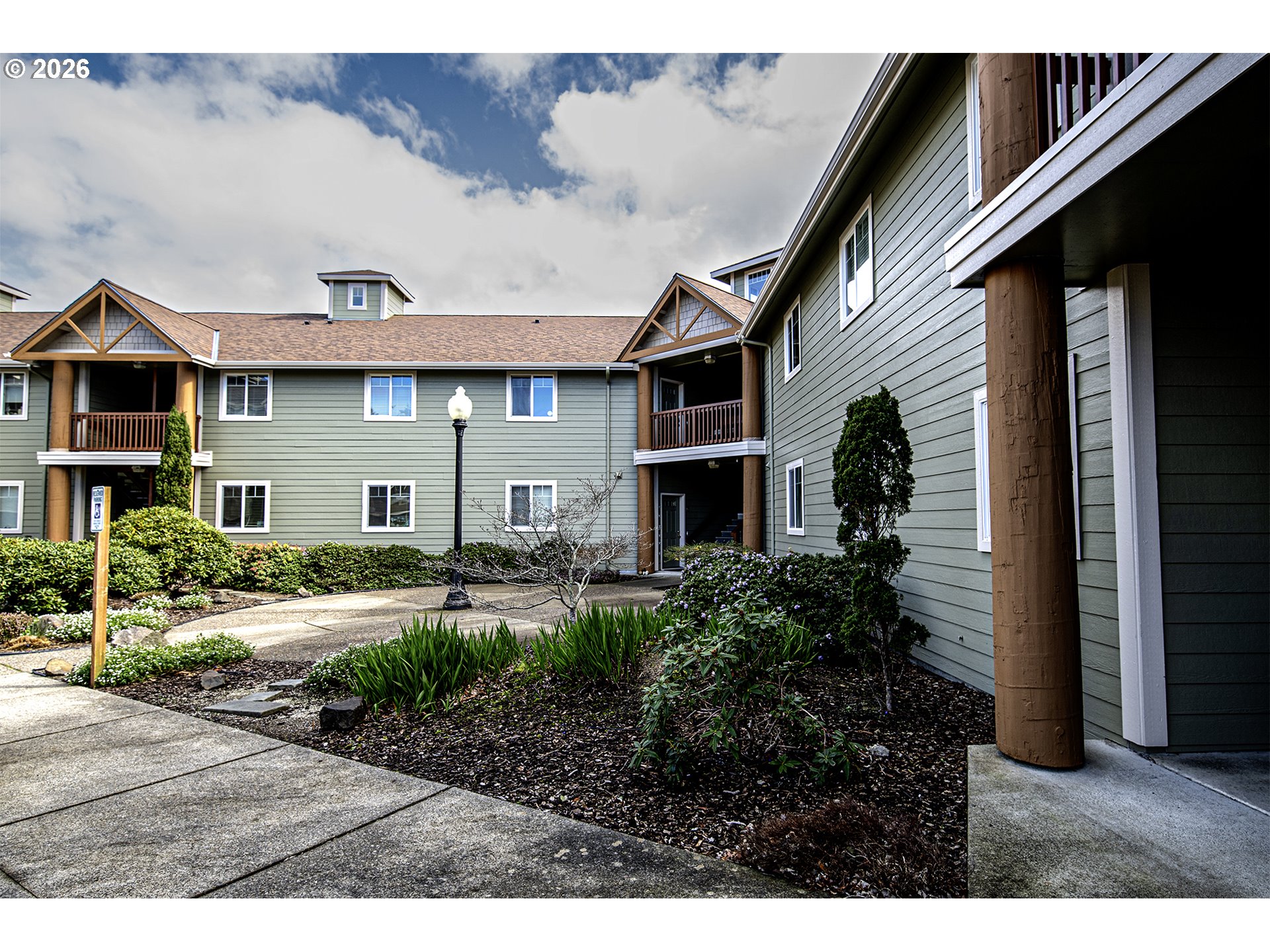 179 Laurel Street, Unit 9 Florence, OR 97439 - Photo 5 of 37 a view of outdoor space and yard