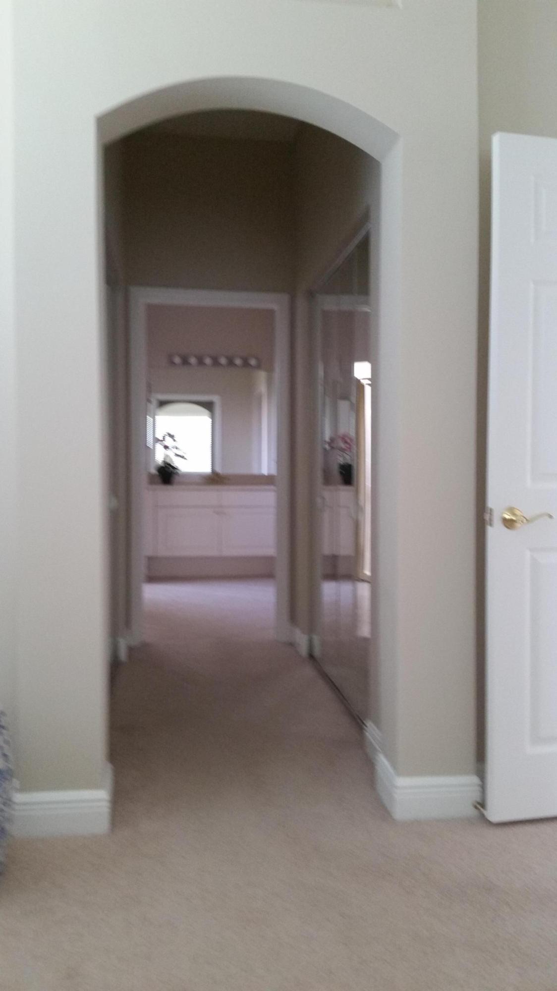 407 Springview Loop Port St. Lucie, FL 34986 - Photo 9 of 18 master bedroom hallway