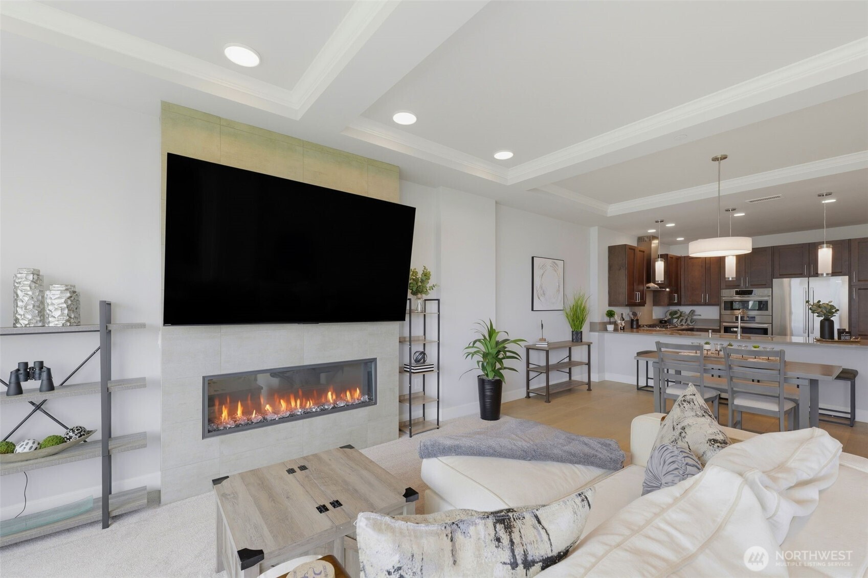 4907 Main Street, Unit 214 Tacoma, WA 98407 - Photo 5 of 34 a living room with fireplace furniture and a flat screen tv