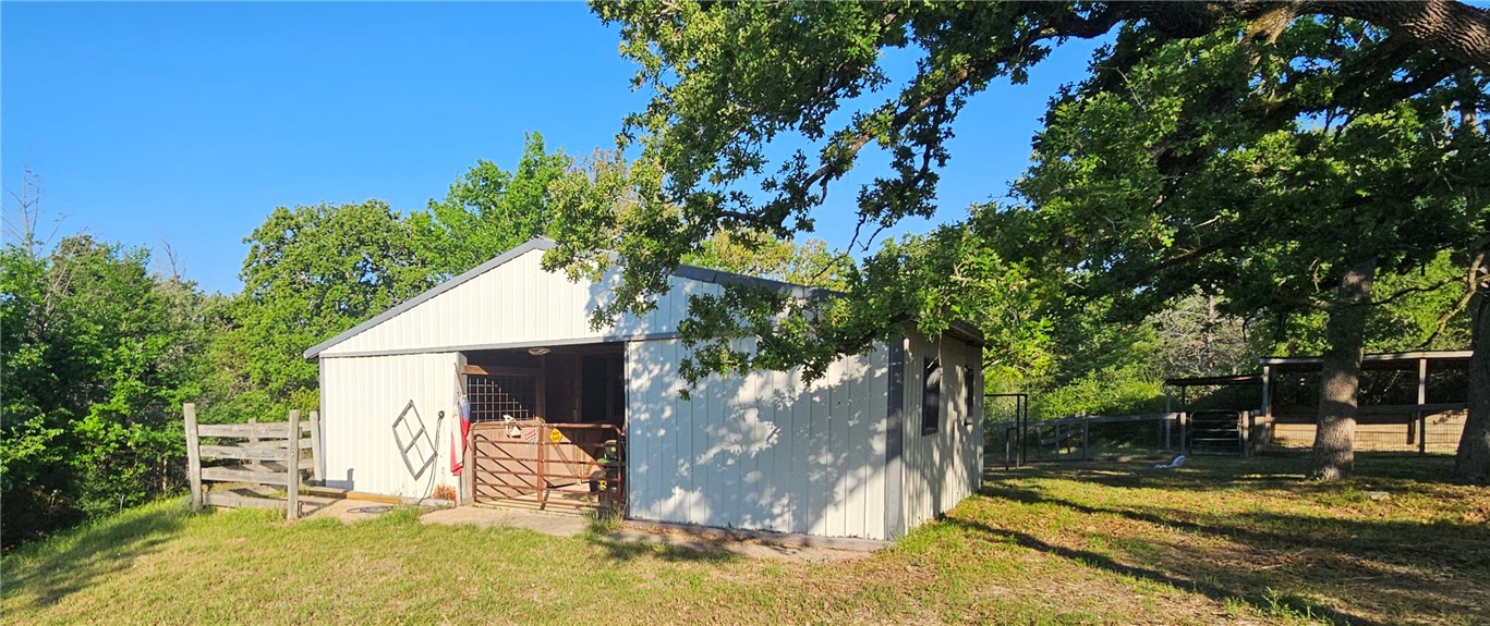 6538 Olympia Buddy Road College Station, TX 77845 - Photo 38 of 50 a view of a house with a tree in the background