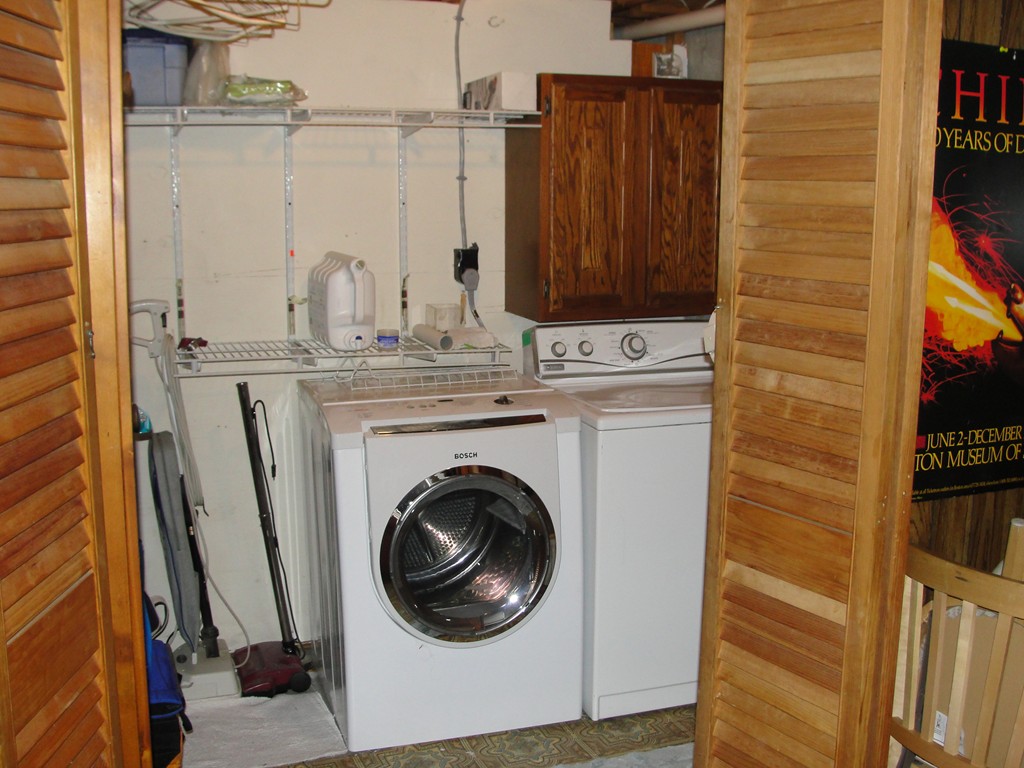 133 Walnut Plain Road Rochester, MA 02770 - Photo 26 of 30 a view of a utility room with dryer and washer