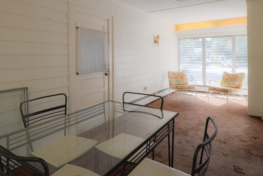 83 Lafayette Street Marblehead, MA 01945 - Photo 12 of 25 a view of a room with a table and chairs