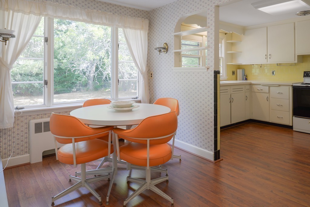 83 Lafayette Street Marblehead, MA 01945 - Photo 5 of 25 a view of a dining room with furniture window and wooden floor
