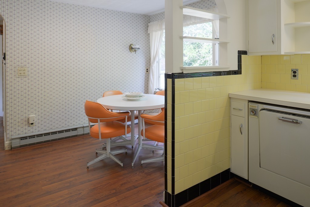 83 Lafayette Street Marblehead, MA 01945 - Photo 10 of 25 a view of a room that has a table and chair in it