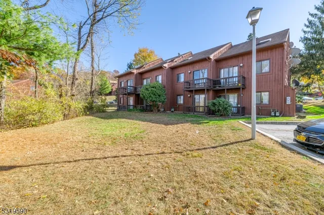 a view of a building with a street