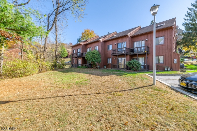 5 Sugar Loaf Court, Unit 7 Vernon, NJ 07462 - Photo 16 of 20 a view of a building with a street