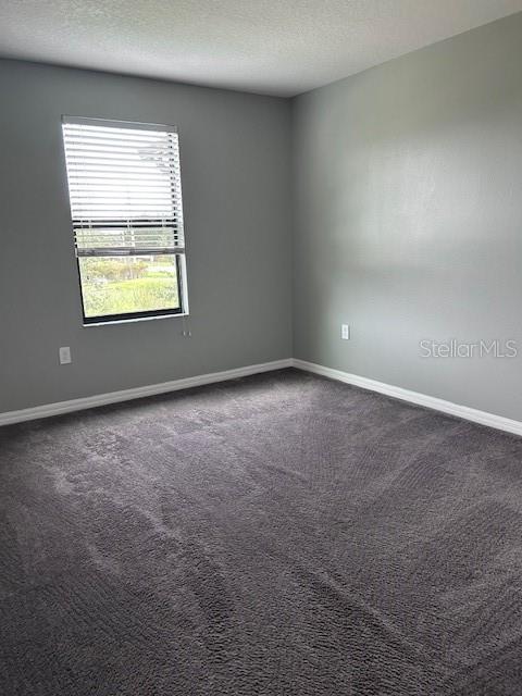 2406 Seven Oaks Drive St. Cloud, FL 34772 - Photo 8 of 11 an empty room with windows