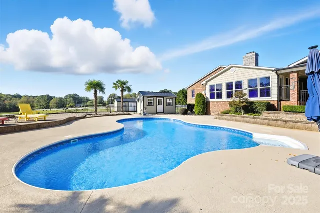 a view of swimming pool of outdoor seating