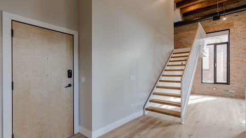 729 North Sangamon Street, Unit 401 Chicago, IL 60642 - Photo 15 of 38 a view of an entryway with staircase