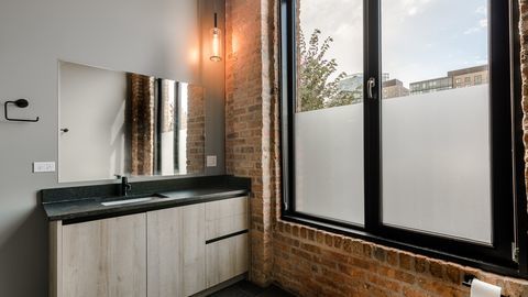 729 North Sangamon Street, Unit 401 Chicago, IL 60642 - Photo 17 of 38 a view of a mirror
