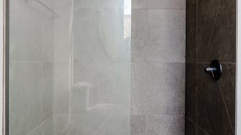 729 North Sangamon Street, Unit 401 Chicago, IL 60642 - Photo 18 of 38 a close view of shower tap