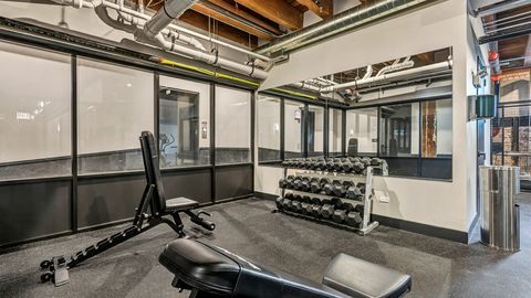 729 North Sangamon Street, Unit 401 Chicago, IL 60642 - Photo 33 of 38 a view of a room with gym equipment