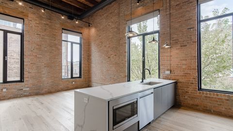729 North Sangamon Street, Unit 401 Chicago, IL 60642 - Photo 4 of 38 a utility room with a large window