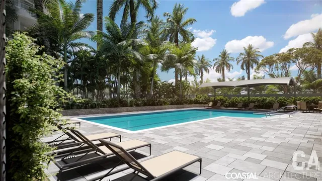 a swimming pool with wooden fence