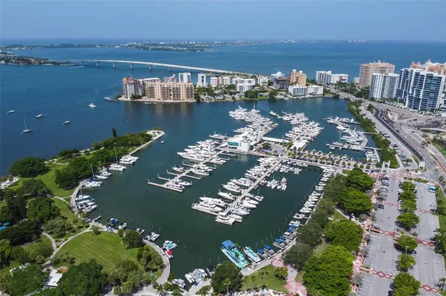 an aerial view of a city with ocean view