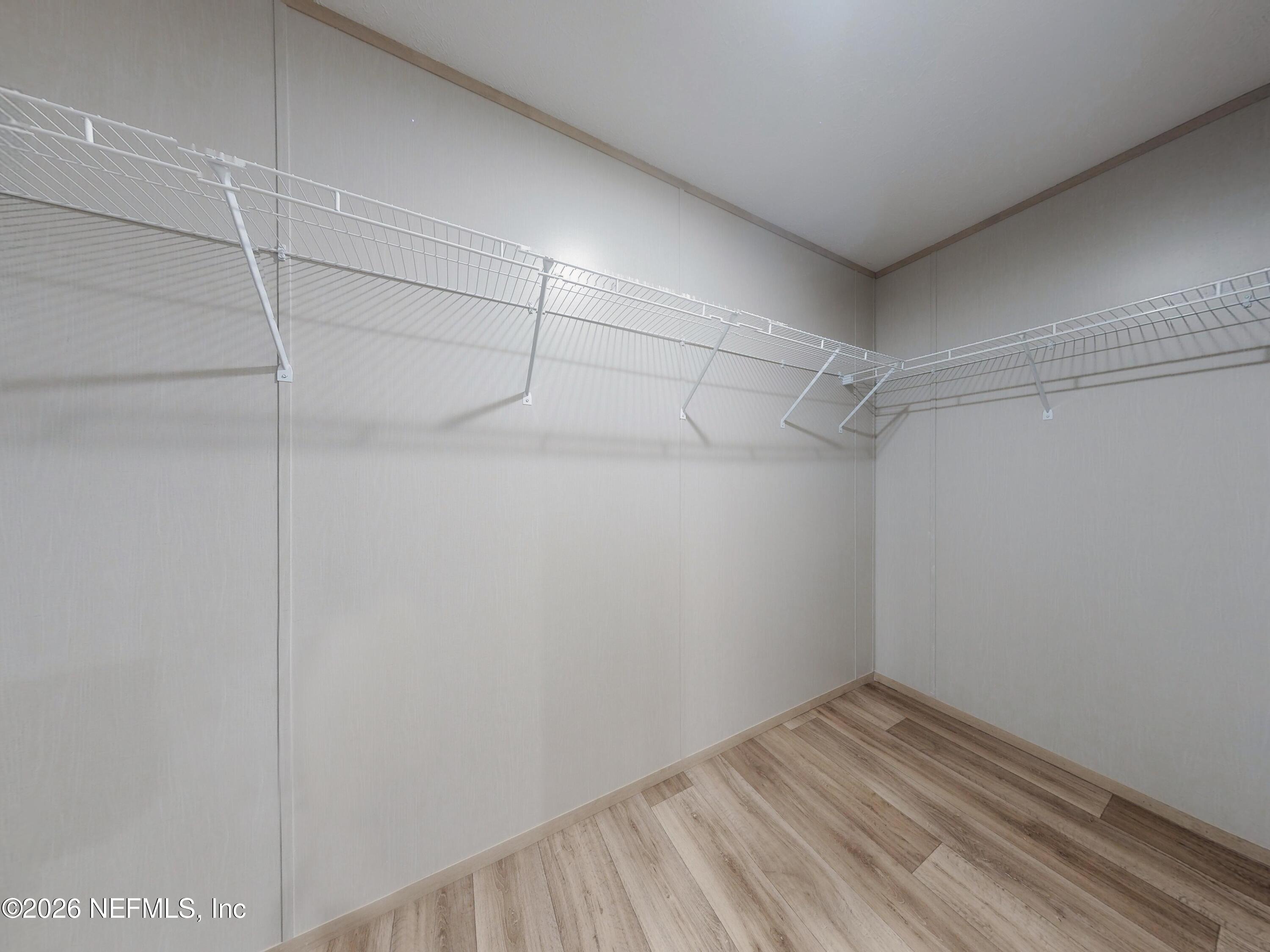 5770 Acadia Street Keystone Heights, FL 32656 - Photo 35 of 64 a view of a room with racks on the wall