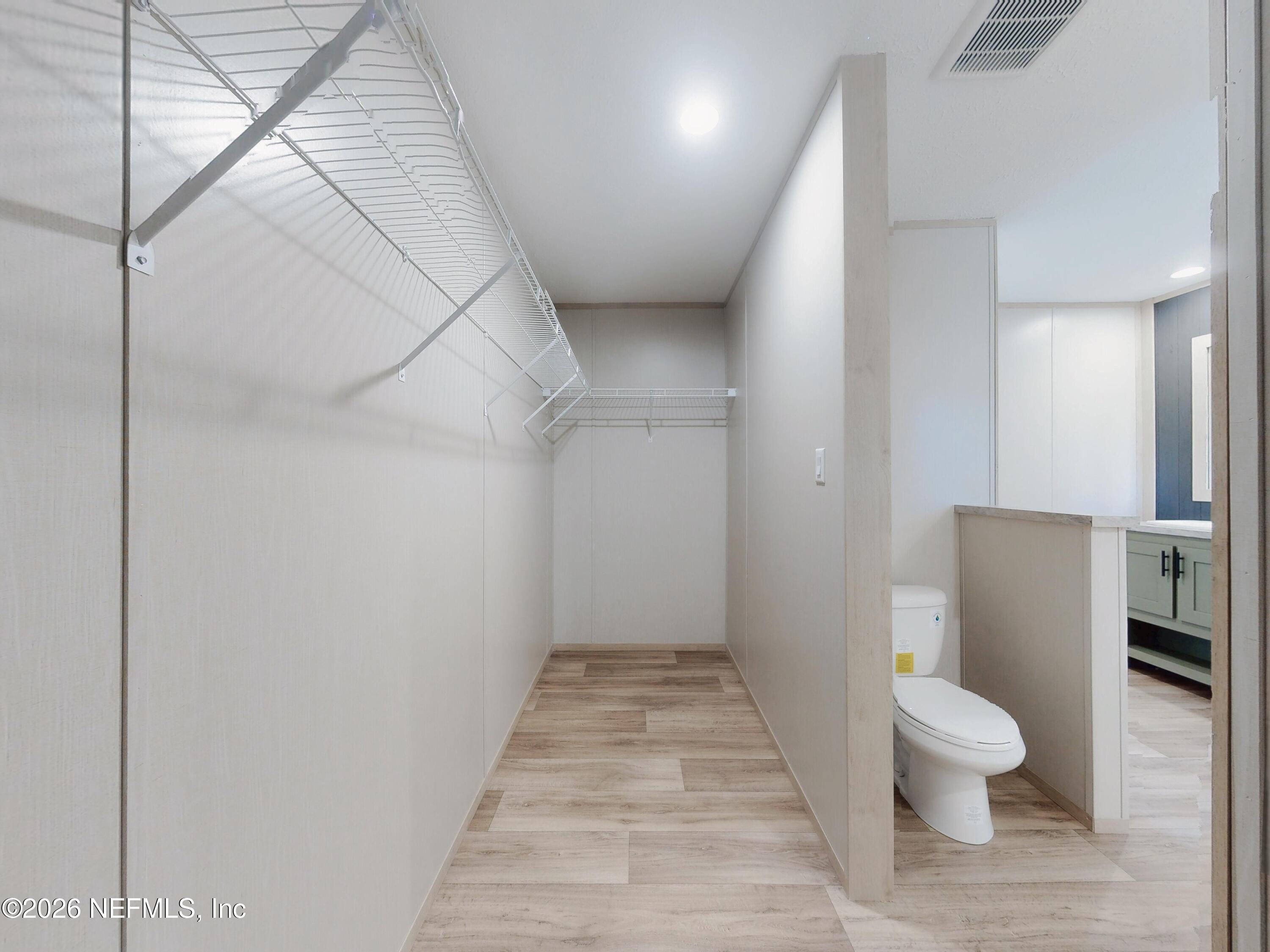 5770 Acadia Street Keystone Heights, FL 32656 - Photo 36 of 64 a bathroom with a toilet and a shower