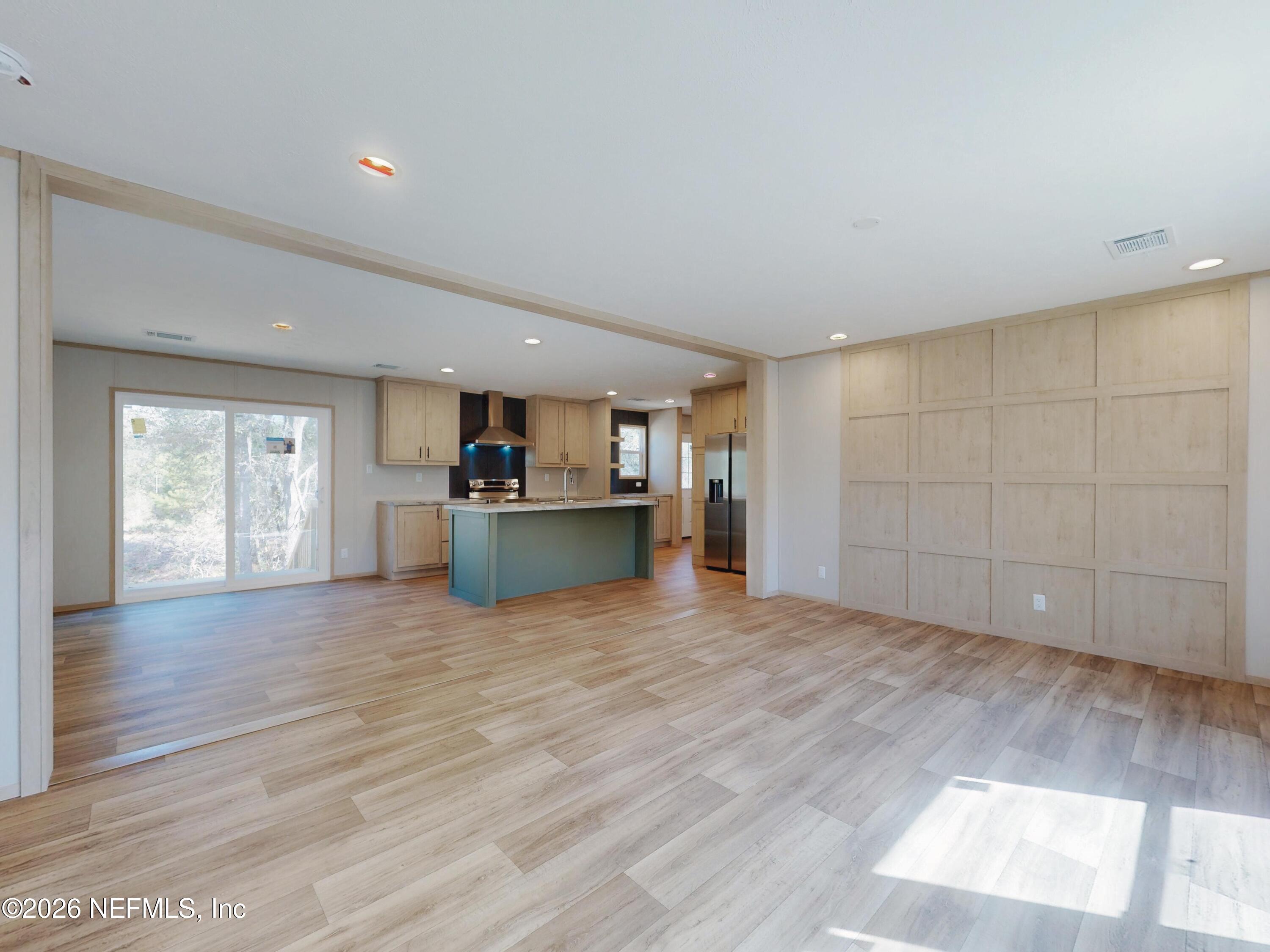 5770 Acadia Street Keystone Heights, FL 32656 - Photo 6 of 64 a view of a kitchen with a sink and a stove top oven