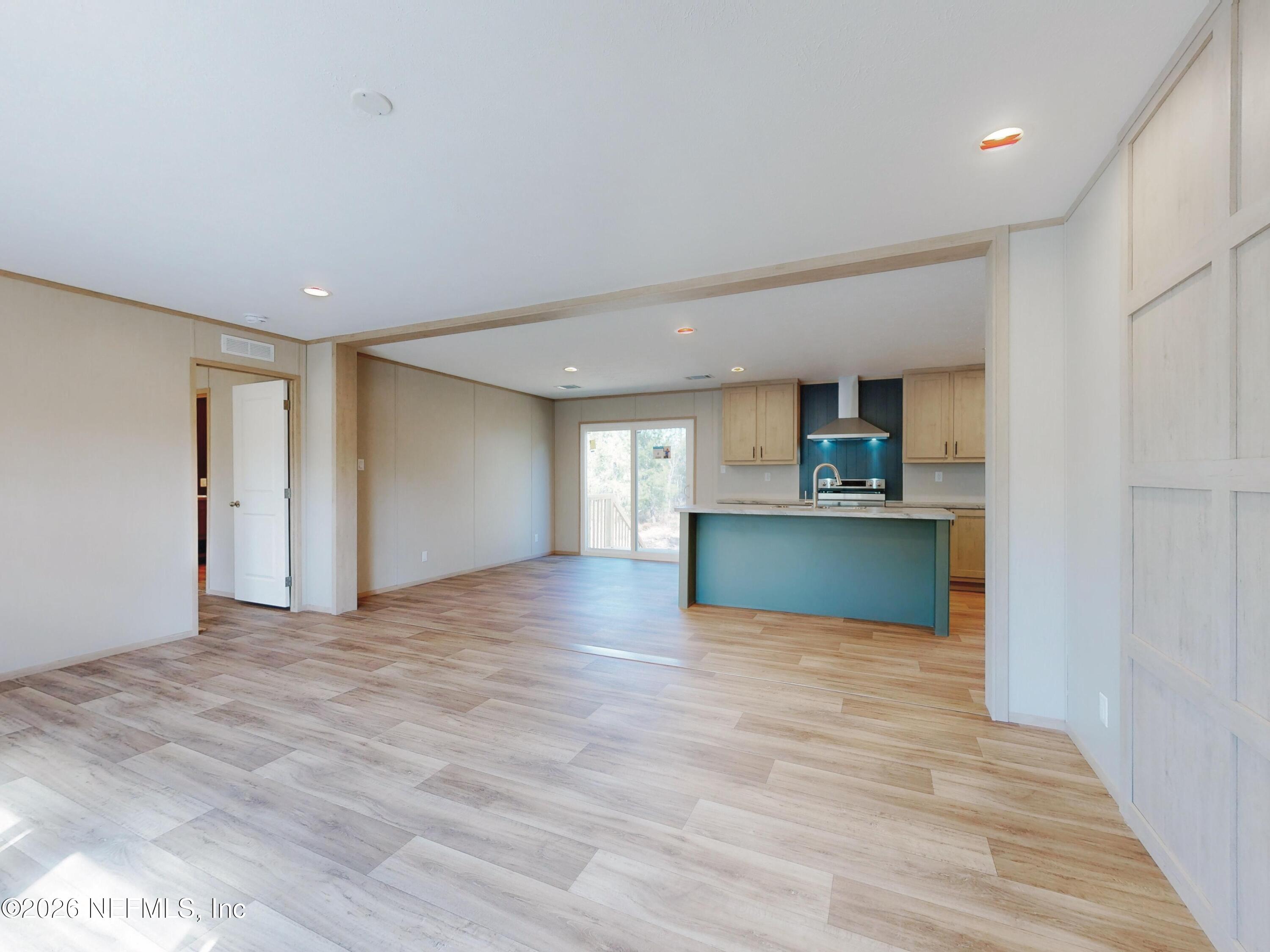 5770 Acadia Street Keystone Heights, FL 32656 - Photo 7 of 64 a view of a kitchen with a sink and a kitchen