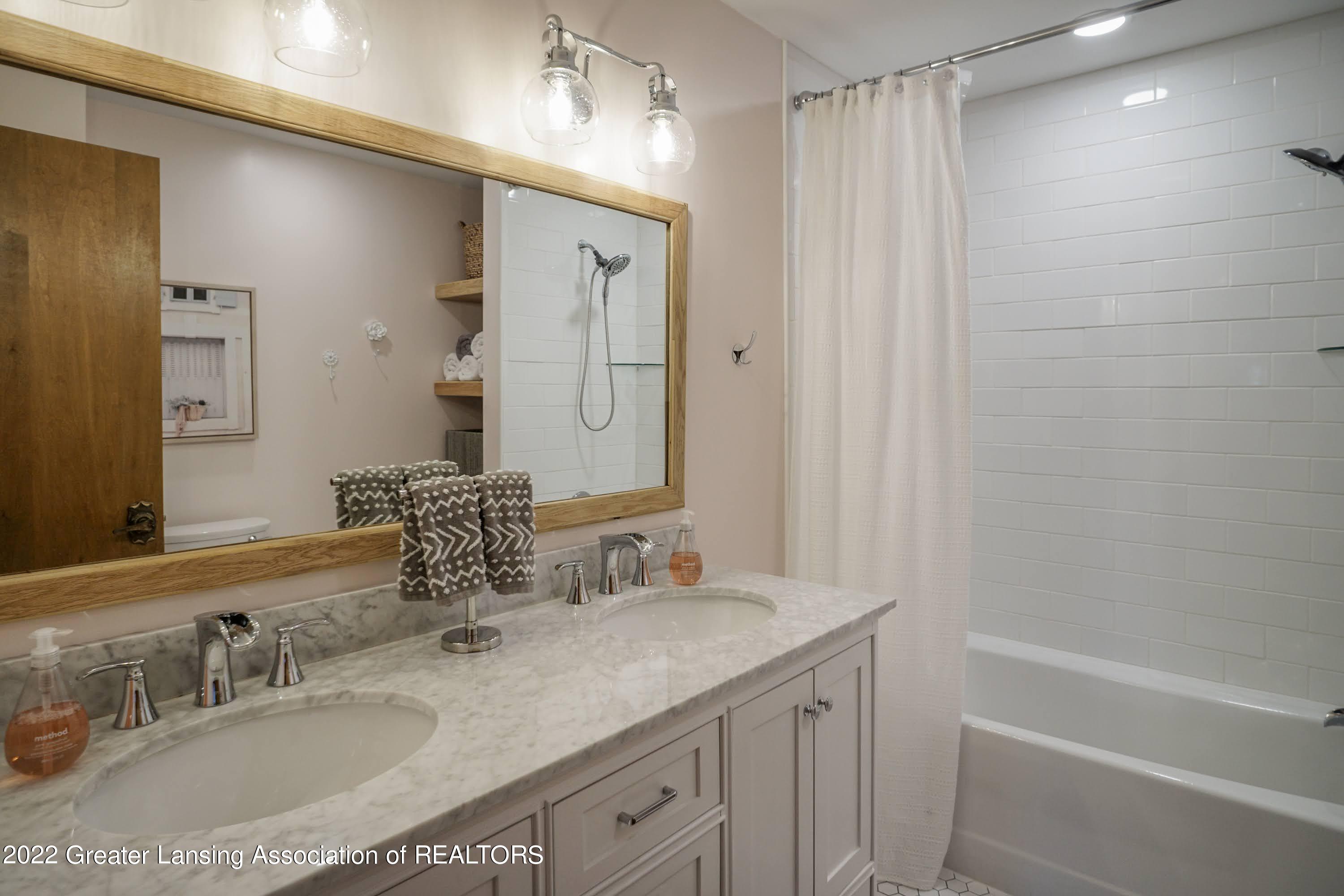 945 Kingsbridge Road Grand Ledge, MI 48837 - Photo 38 of 57 Guest bath 1
