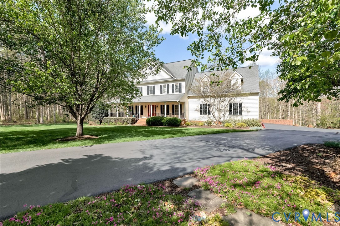 14436 Overlook Ridge Lane Beaverdam, VA 23015 - Photo 2 of 82 a view of a house with a yard and large tree