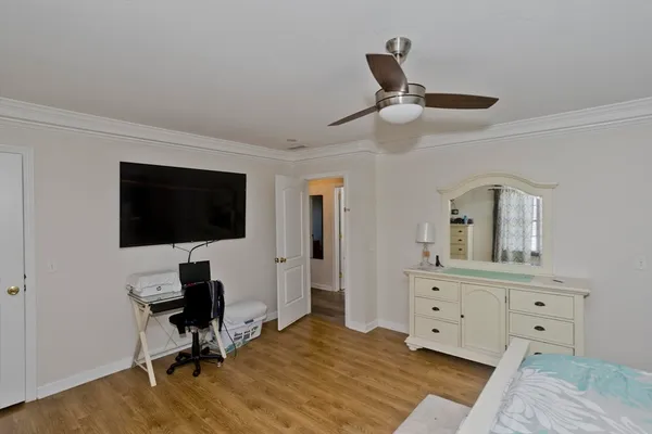 a view of workspace with wooden floor