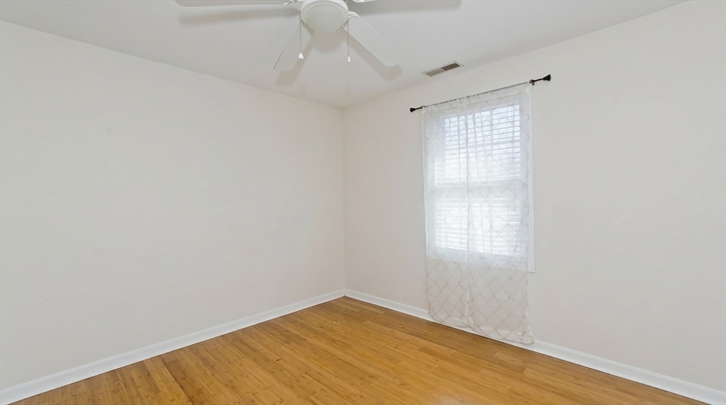 31 Acrebrook Road Springfield, MA 01129 - Photo 15 of 31 an empty room with wooden floor and windows