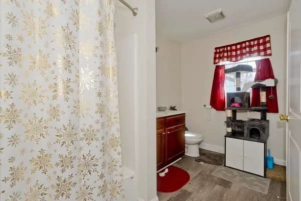 a bathroom with a toilet and a sink