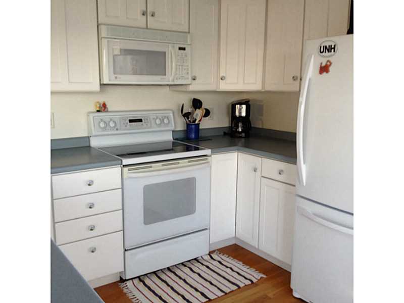 5 Barnacle Road Narragansett, RI 02882 - Photo 4 of 21 Kitchen. Hardwood floor throughout kitchen & living room.