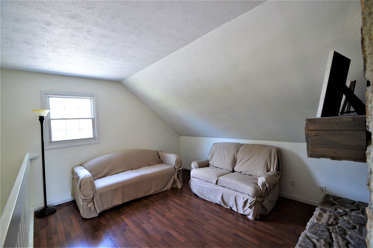 4830 Crown Point Circle Roscoe, IL 61073 - Photo 15 of 19 a bedroom with a bed and a couch