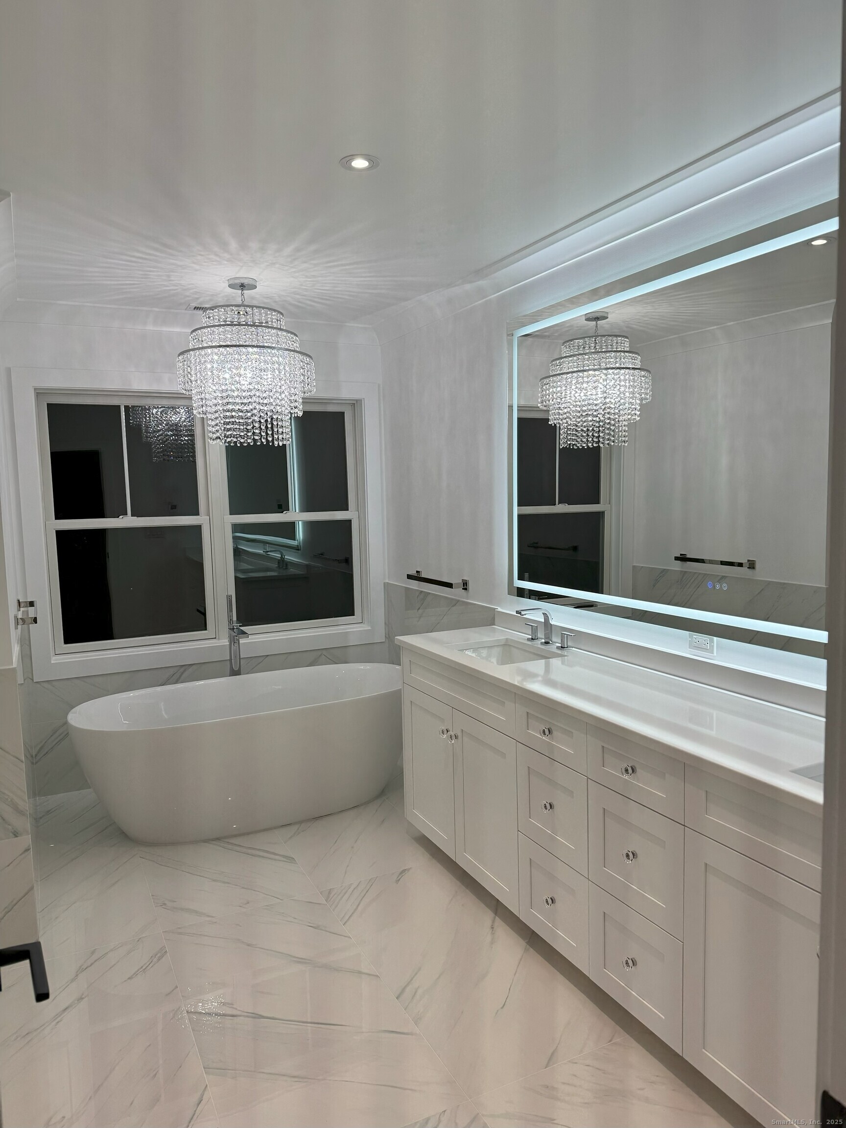 109 Signal Hill Road Wilton, CT 06897 - Photo 11 of 18 a bathroom with a granite countertop sink mirror and bathtub