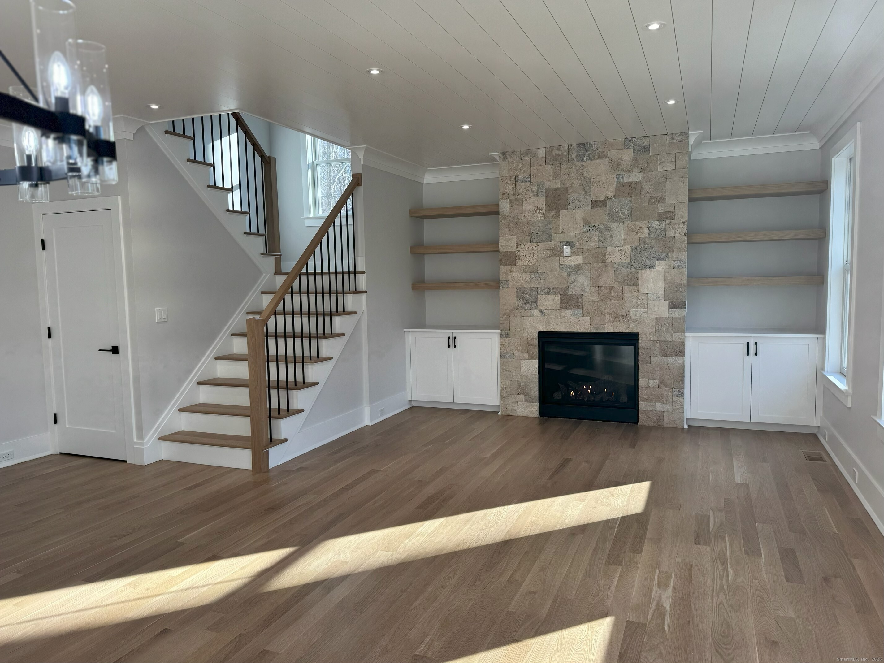 109 Signal Hill Road Wilton, CT 06897 - Photo 6 of 18 a view of entryway and hall with wooden floor