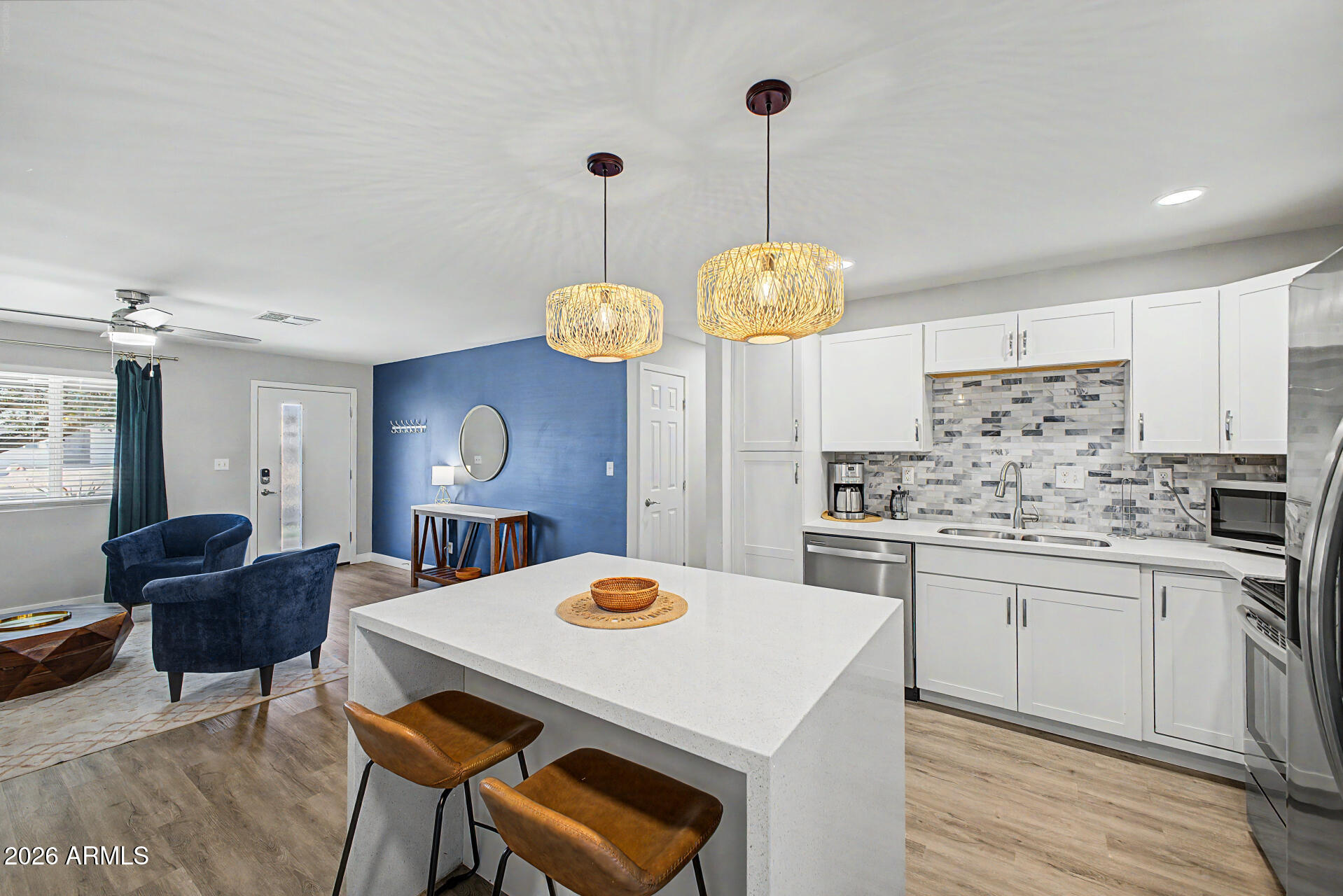 955 East Marigold Lane Tempe, AZ 85288 - Photo 11 of 32 a kitchen that has a table and chairs in it