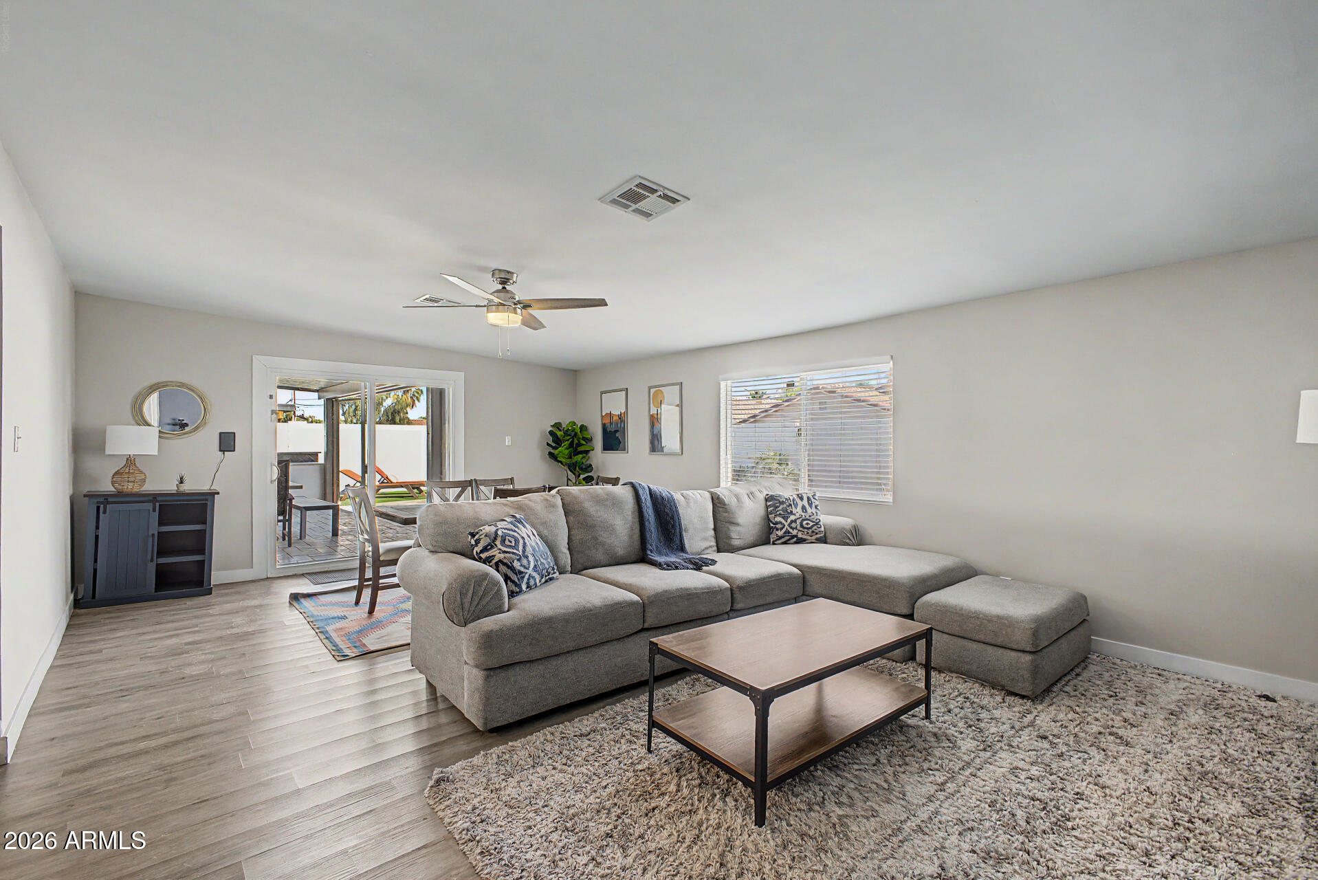 955 East Marigold Lane Tempe, AZ 85288 - Photo 14 of 32 a living room with furniture and a fireplace
