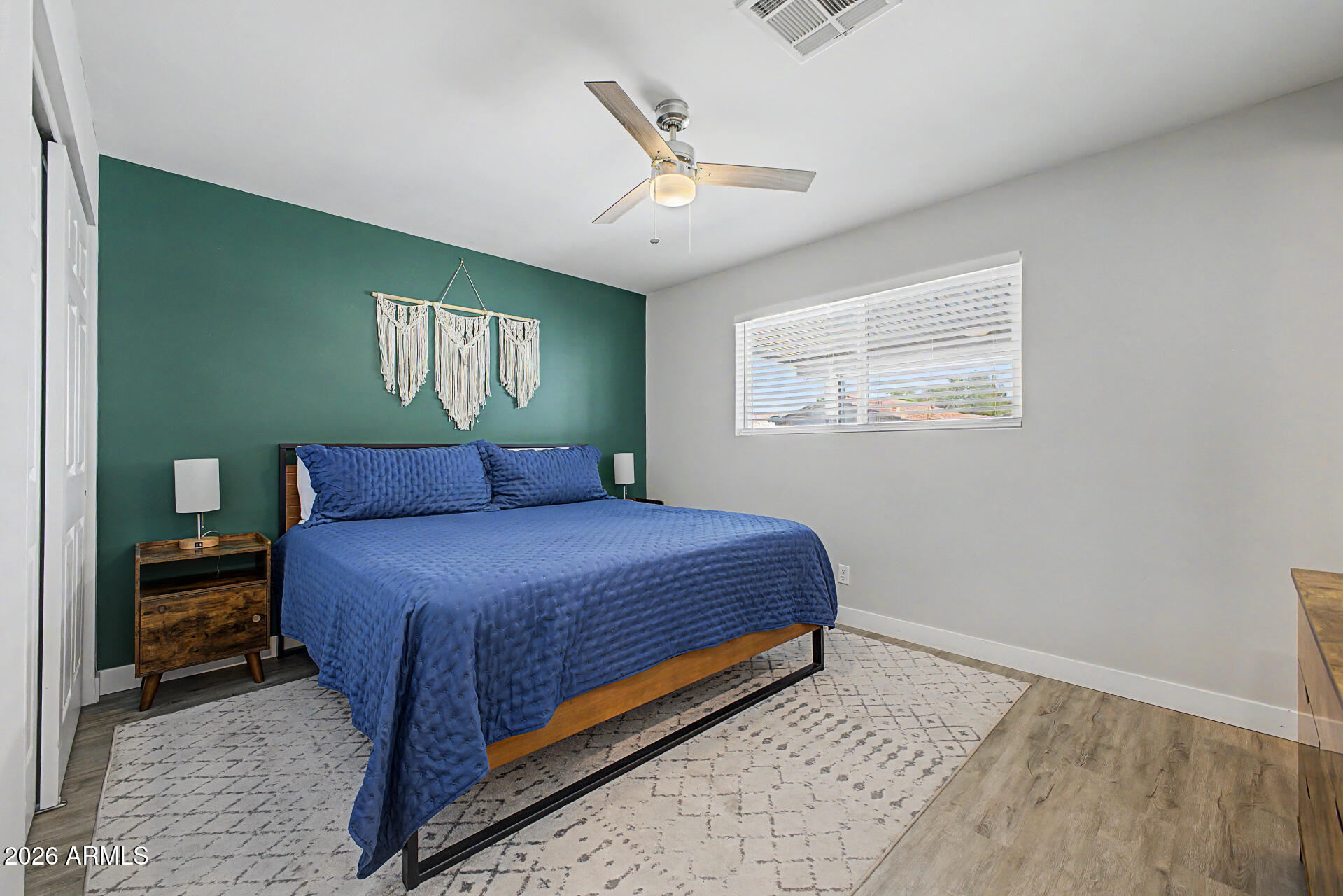 955 East Marigold Lane Tempe, AZ 85288 - Photo 15 of 32 a bedroom with a bed and window