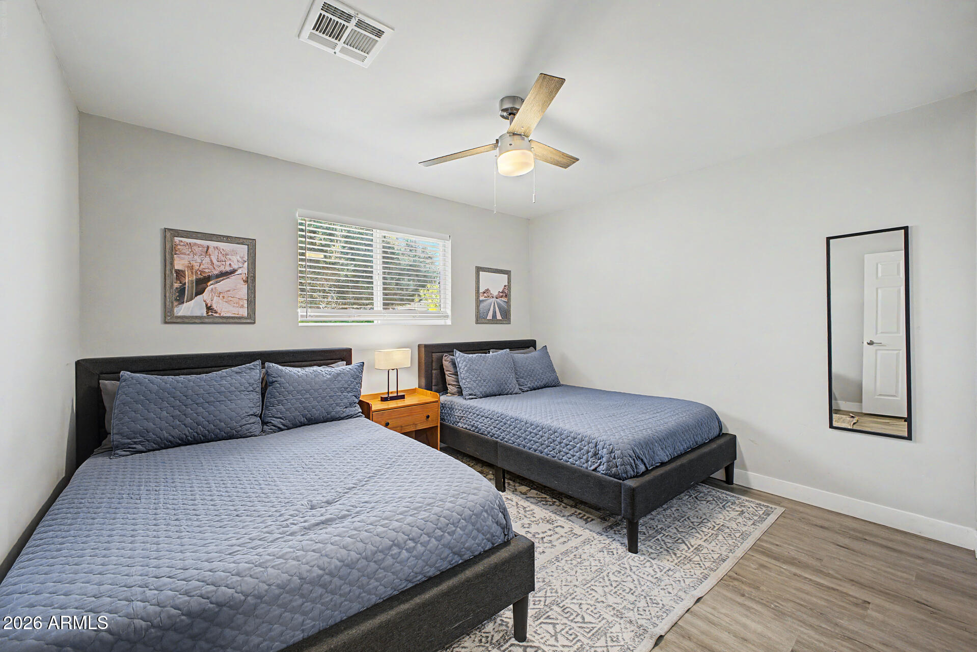 955 East Marigold Lane Tempe, AZ 85288 - Photo 20 of 32 a bedroom with furniture and window