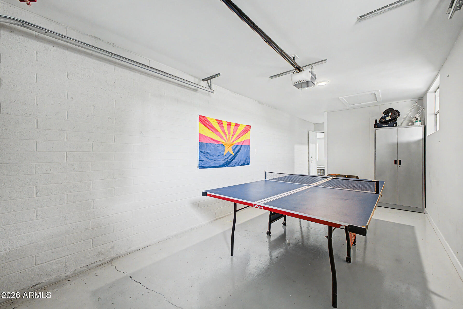 955 East Marigold Lane Tempe, AZ 85288 - Photo 22 of 32 a view of a room with furniture and wooden floor