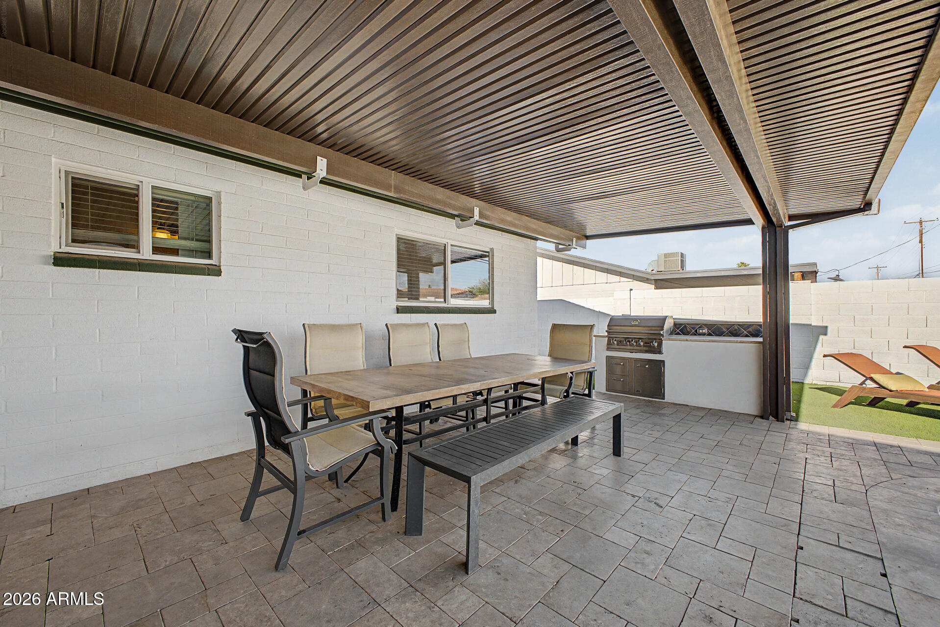 955 East Marigold Lane Tempe, AZ 85288 - Photo 26 of 32 a view of a chairs and table in a patio