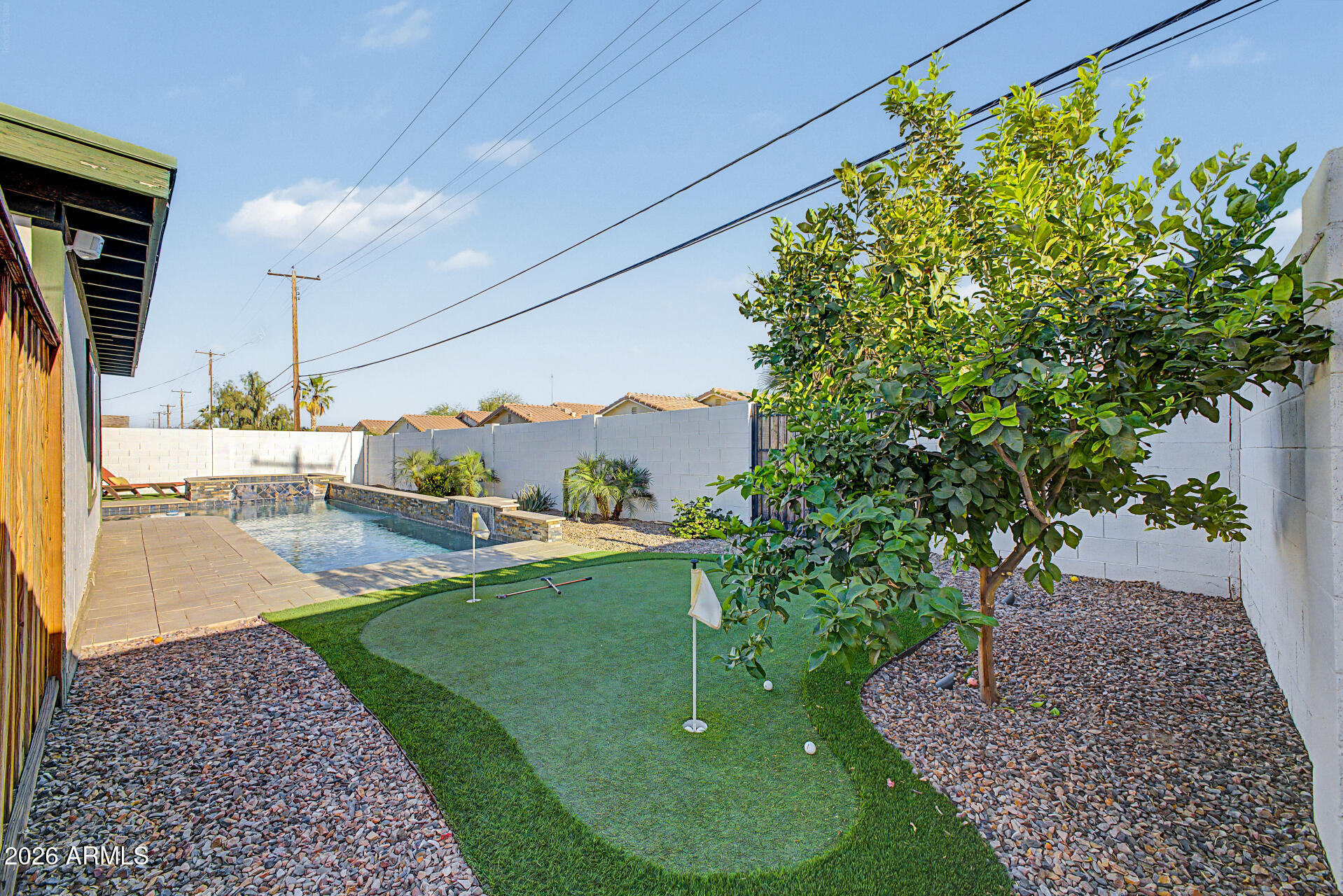 955 East Marigold Lane Tempe, AZ 85288 - Photo 30 of 32 a view of a swimming pool with a patio