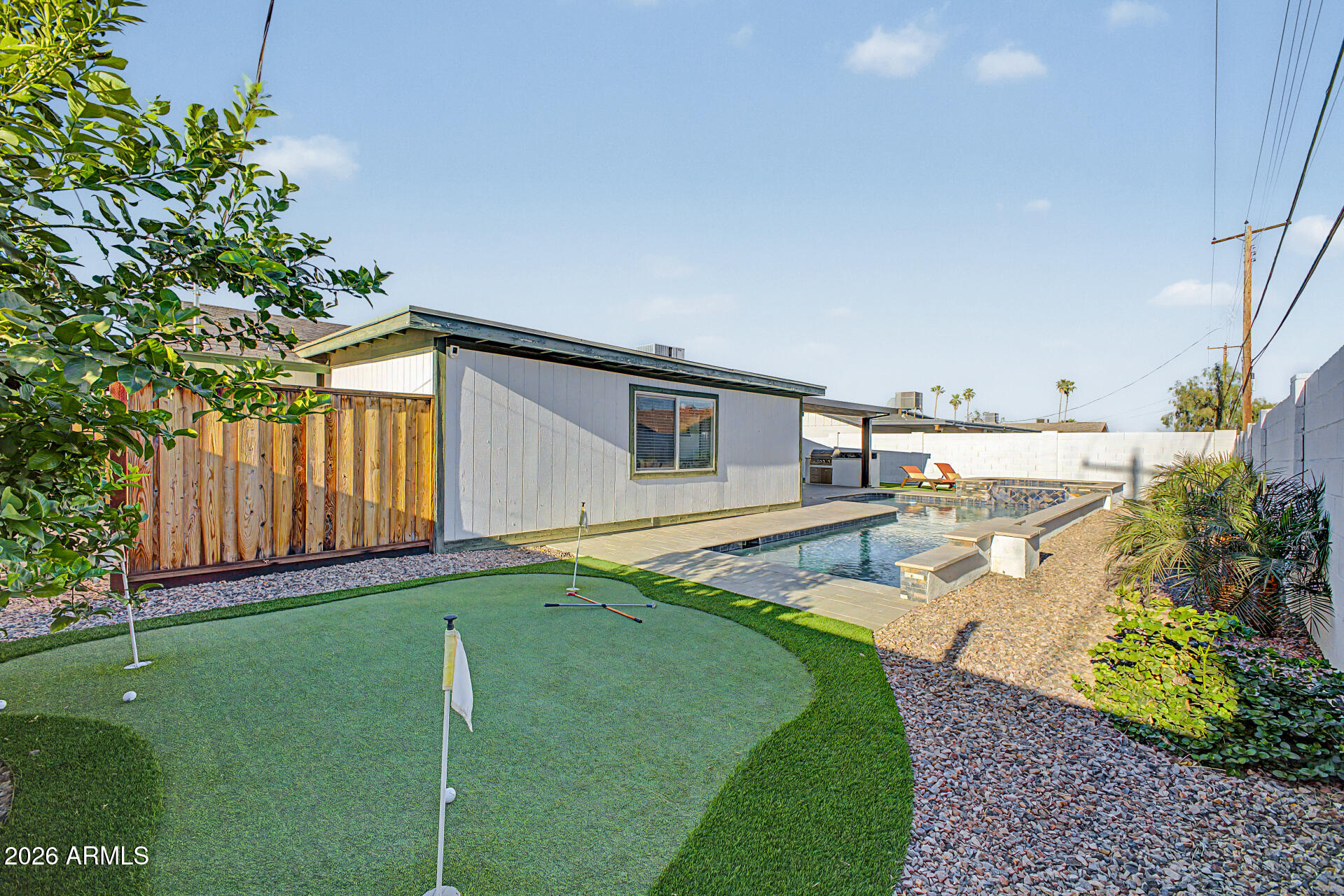 955 East Marigold Lane Tempe, AZ 85288 - Photo 31 of 32 a view of a house with backyard and sitting area