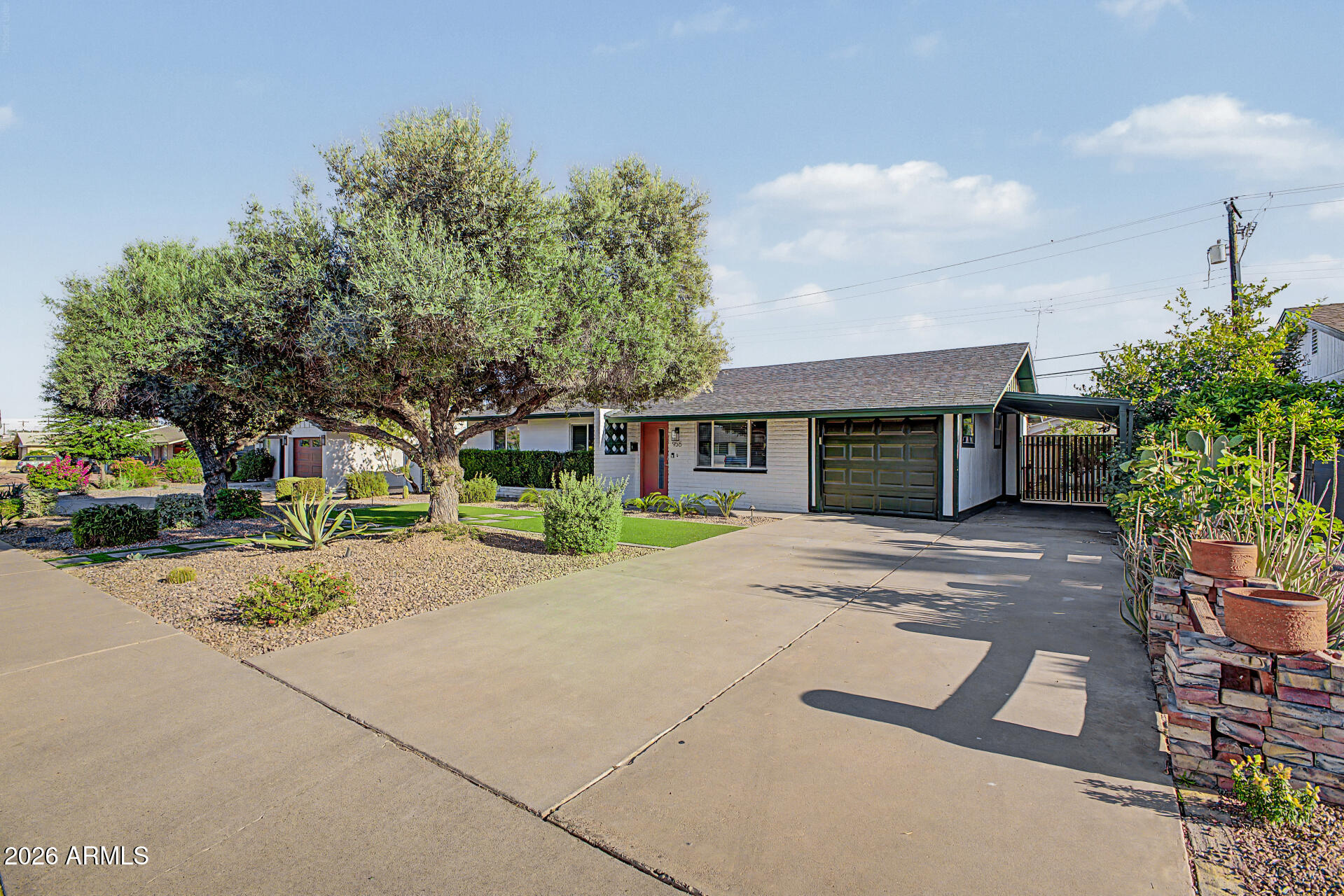 955 East Marigold Lane Tempe, AZ 85288 - Photo 8 of 32 a view of a house with a yard and plants