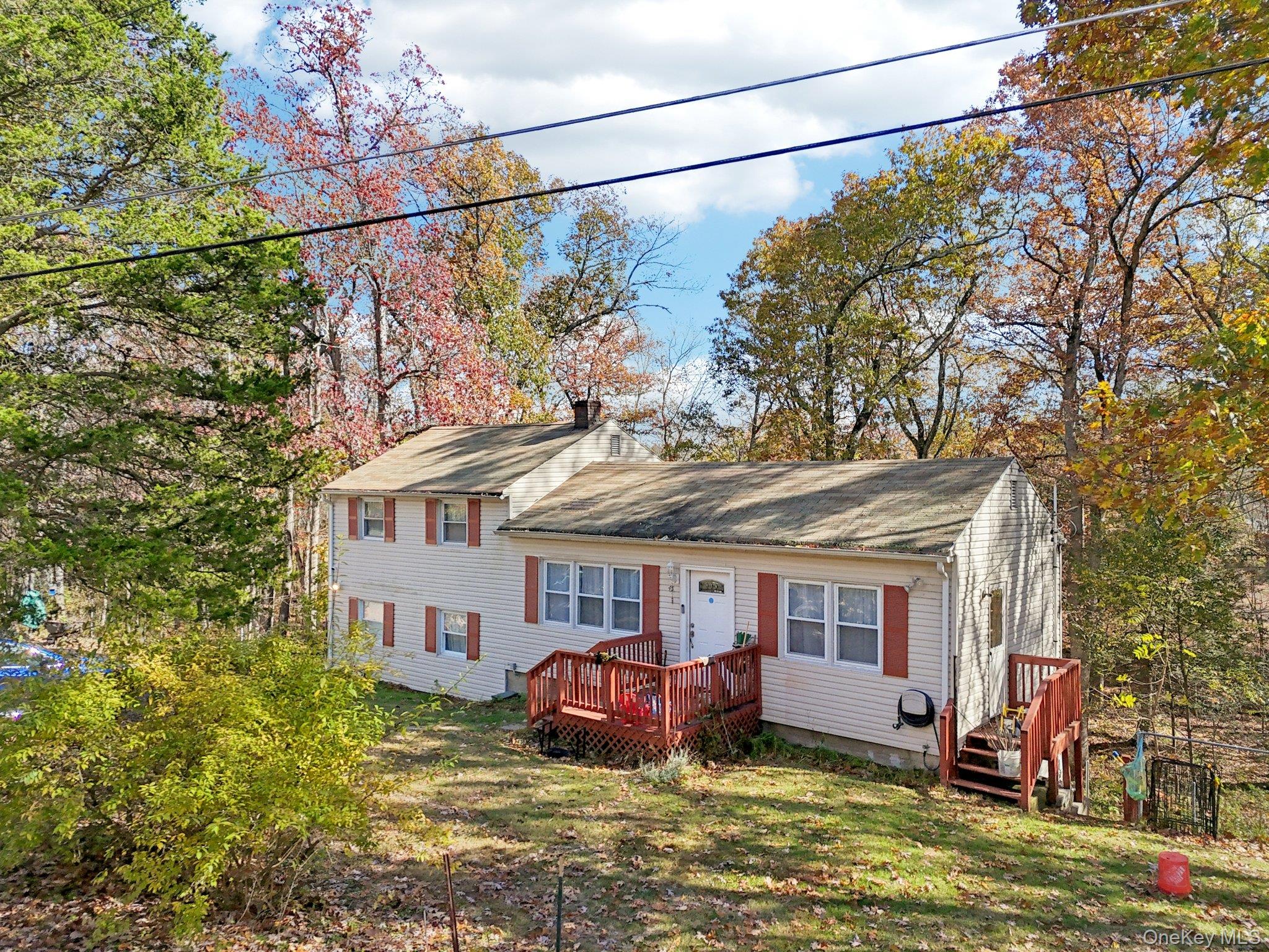 45 East Green Road Rock Tavern, NY 12575 - Photo 19 of 29 a view of a big house with a big yard potted plants and large tree